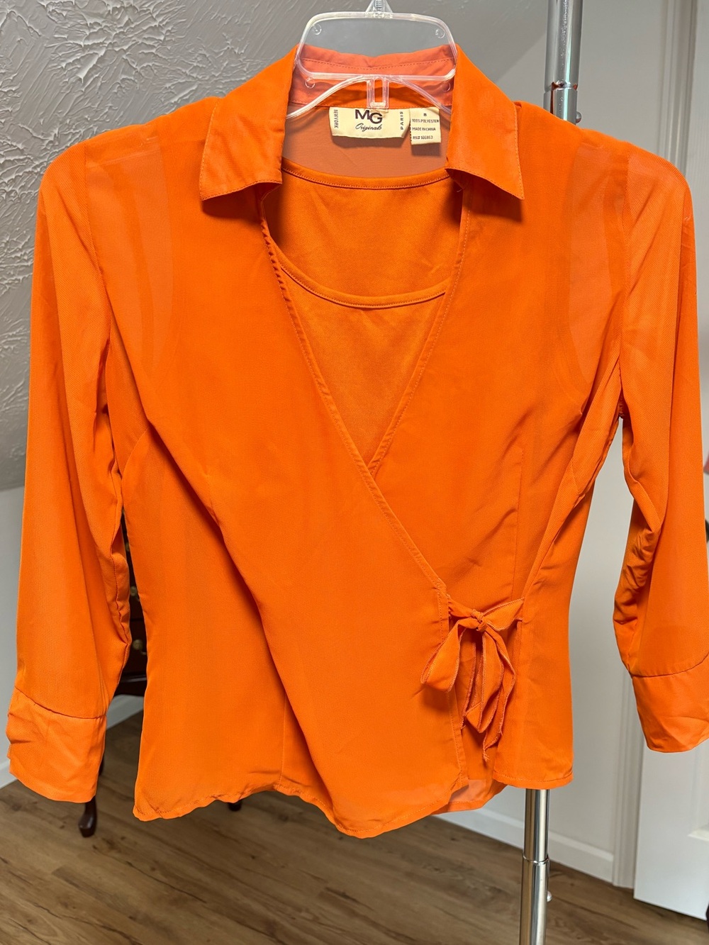 Orange wrap style sheer shirt with attached tank top. MG Originals size 8
